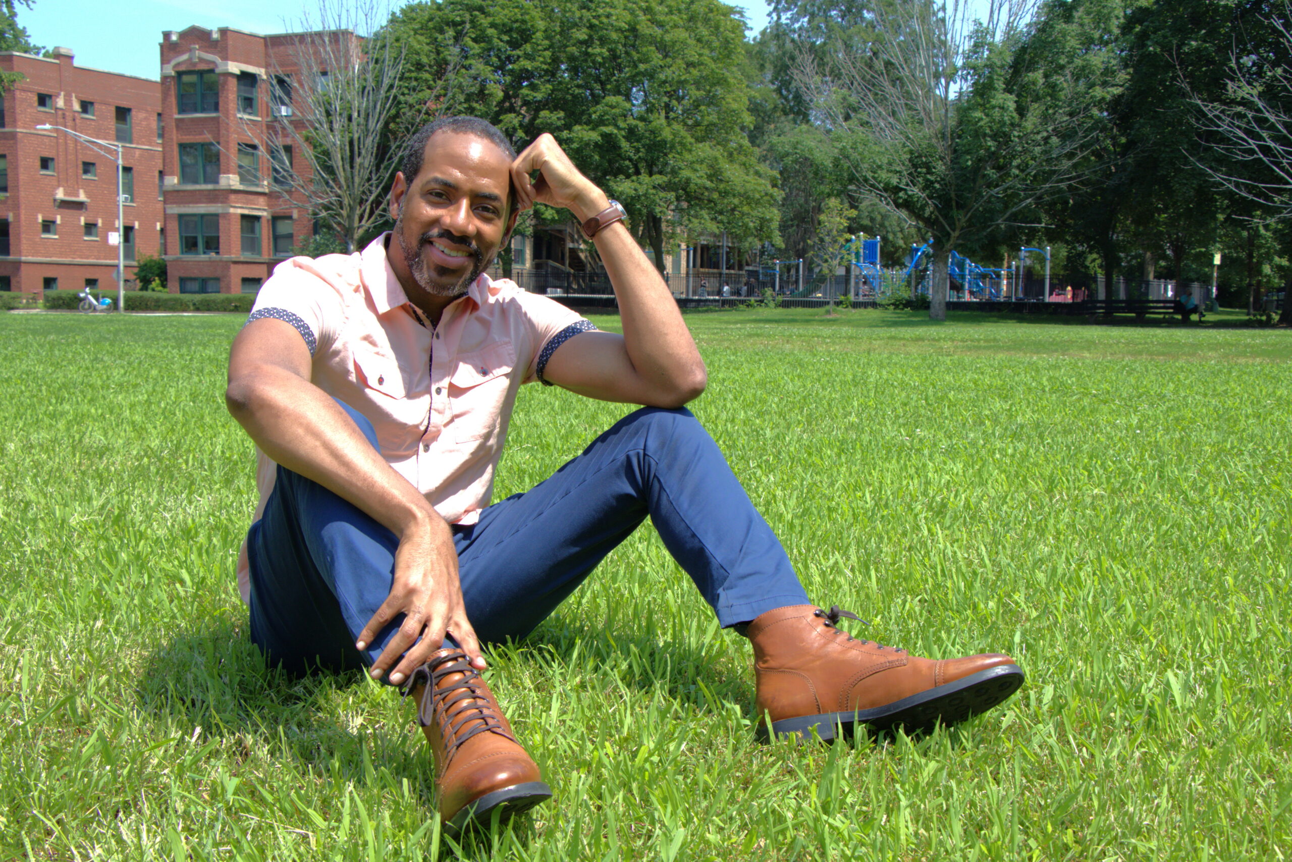 Dr. MK sitting in field